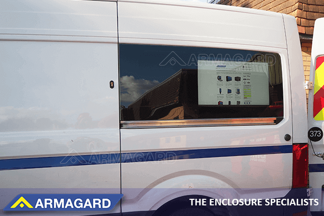 Armagard digital display van 32" enclosure installed in a work van