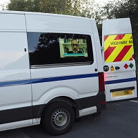 Armagard van-side LED display 24" in a work van with open rear doors